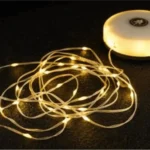 Guirlanda luminosa portátil e retrátil com manivela